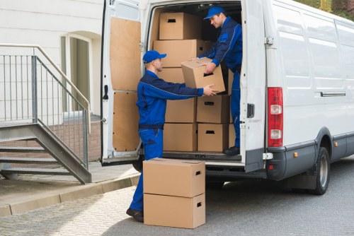 Removal team preparing a Battersea home move with boxes and furniture
