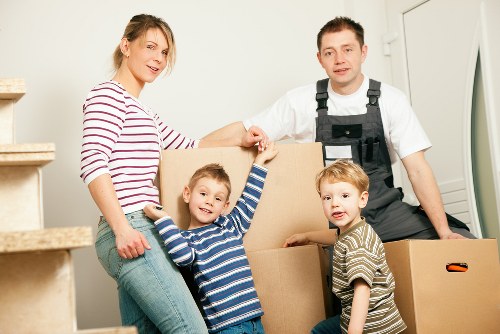 Piano removal service for a Battersea home with staircase protection