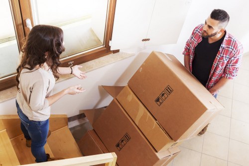 Careful loading of boxes and furniture for a Battersea flat move