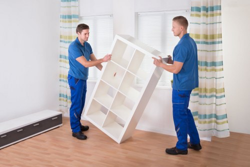 Furniture loaded into a moving truck for transport in Battersea